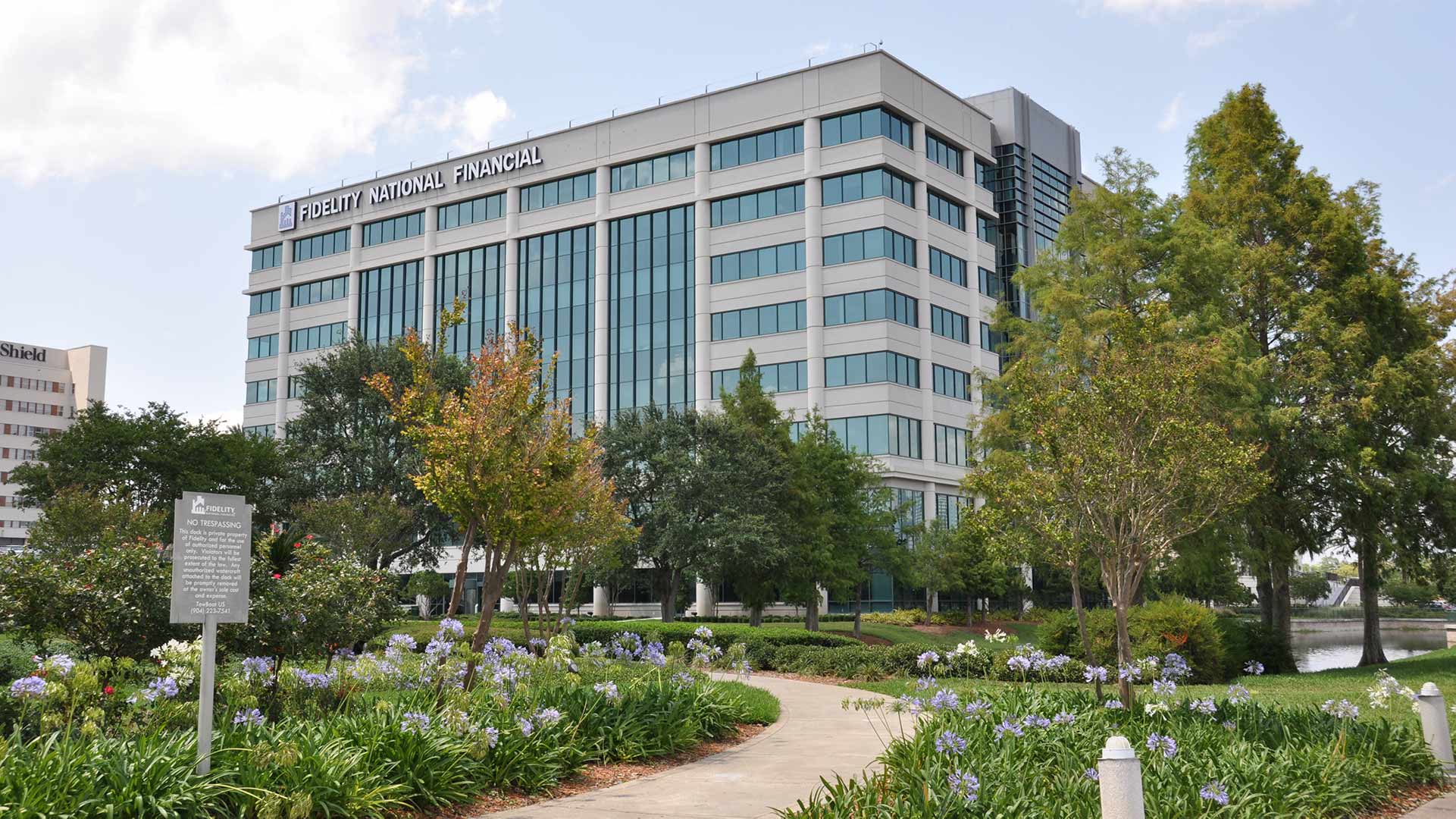 Fidelity National Headquarters Building|Exterior of Parking Garage|Front of Headquarters Building|Vehicle exiting Parking Garage||||
