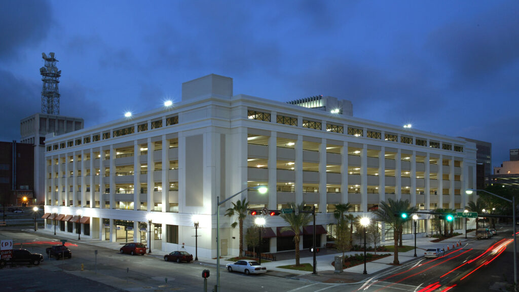 Exterior photo of City of Jacksonville parking garage at dusk.