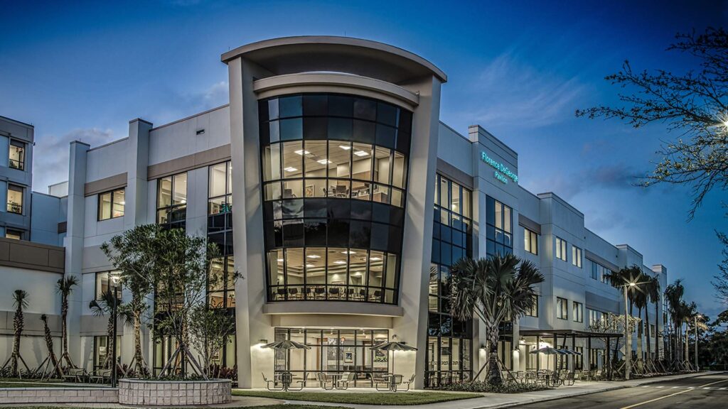 Exterior view of Jupiter Medical Center at dusk