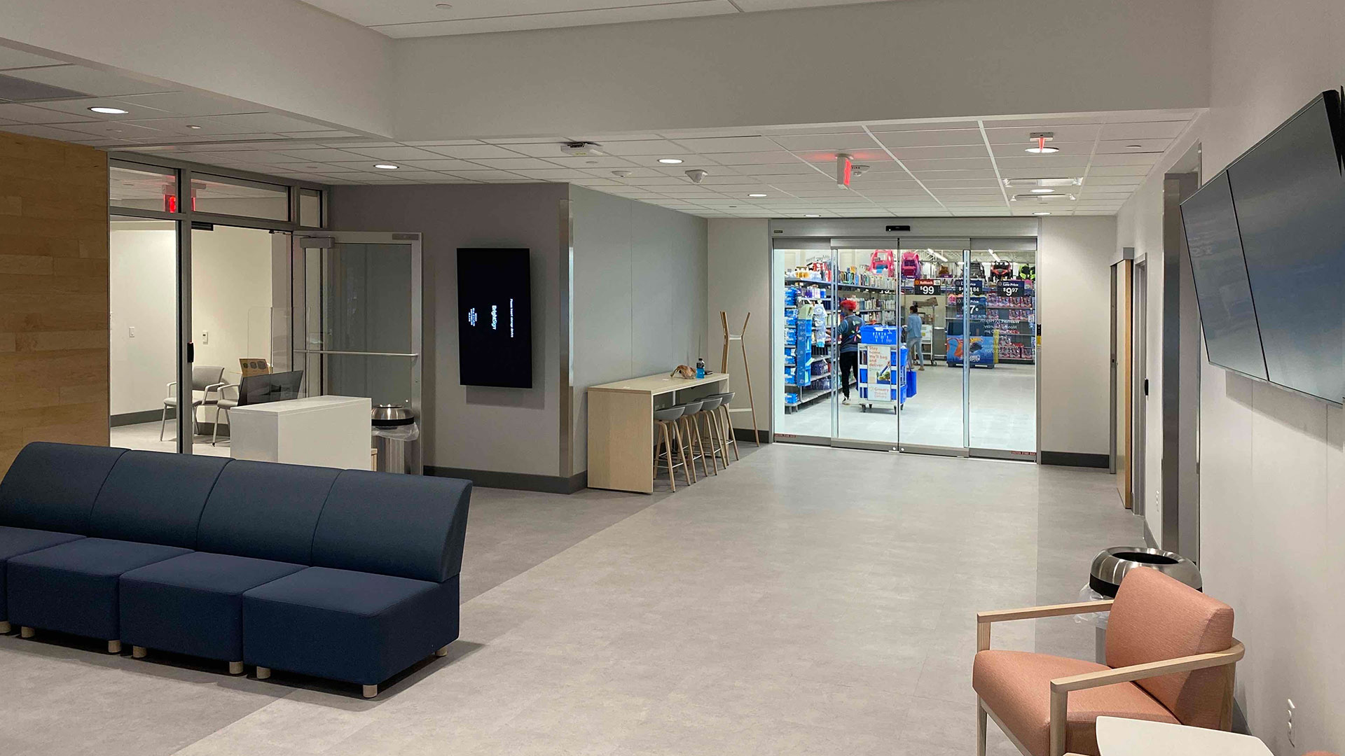 Newnan Clinic Lobby|Exterior photo of BLOX Uber Modules|Construction photo of Lab Module being set by crane|Interior hallway in the Newnan Clinic|Dental Exam Room|Interior photo of Medical Bay|Lobby area|Roof Rack placement||||||||