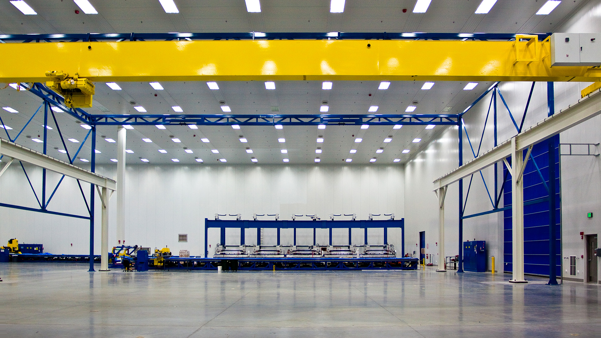 Interior of Spirit AeroSystems Composite Center. Large open room with fluorescent lighting.|